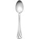 A Libbey stainless steel teaspoon with a curved handle.