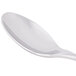 A Libbey stainless steel teaspoon with a silver handle.