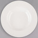 A Libbey porcelain pasta bowl with a wide white rim.