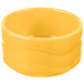 A yellow Libbey Cantina bowl with a wavy design on a white background.