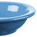 A close up of a blue Libbey Cantina fruit bowl with a white rim.