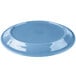 A blue Libbey oval porcelain platter with a carved design on a white background.