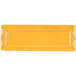 A yellow rectangular Libbey Cantina tray with a wavy pattern.