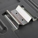 A metal bracket on a black plastic container with a Commercial Zone pole-mounted windshield service center.