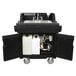 A black Cambro CamKiosk portable hand sink with a white container inside.