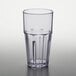 A close-up of a clear plastic GET Bahama tumbler with a black rim.