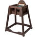 A Koala Kare brown high chair with a tray.