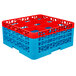 A red and blue plastic Carlisle glass rack with extenders.