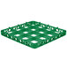 A green plastic glass rack extender with rows of holes.
