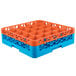 A blue and orange plastic Carlisle OptiClean glass rack with holes.