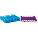 A blue and purple plastic Carlisle glass rack with a purple extender.