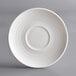 A white Tuxton saucer with a circular pattern.