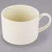 A 10 Strawberry Street Royal Cream porcelain cup and saucer on a white surface.