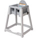 A grey Koala Kare baby high chair.