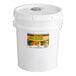 A white Monarch's Choice bucket of honey with a label and a lid.