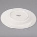 A white Libbey Farmhouse porcelain plate with a wide rim.