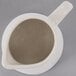 A Libbey Farmhouse ivory porcelain creamer with a handle.