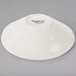 A round ivory porcelain bowl with black text that says "Libbey Farmhouse" on it.