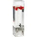 A Cal-Mil stainless steel beverage dispenser with ice chamber filled with water and strawberries.