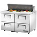 A white True refrigerated sandwich prep table with four drawers and a door.