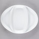 A white porcelain divided platter with three sections.