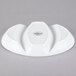 A Libbey white porcelain divided platter with three sections.