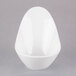 A Libbey white porcelain bowl with an egg shape.