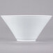 A close-up of a Libbey ultra bright white porcelain bowl with a small rim.