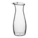 A clear polycarbonate carafe with a hinged lid.
