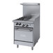 A stainless steel Garland commercial gas range with a griddle.