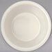 A white fluted ramekin with a circular shape.