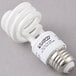 A white spiral light bulb.