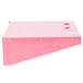 A pink metal shelf with holes.