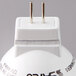 A close up of a Satco 3 watt white narrow flood LED light bulb with a plug.