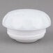 A white plastic lid with a round top on a Vollrath SwirlServe beverage server.