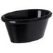 A black oval ramekin with a handle.