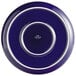 A cobalt blue Tuxton pizza serving plate with white trim.