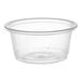 A clear plastic 2 oz. souffle or portion cup.