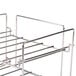 A metal Prince Castle Saber King wire rack with two shelves and metal rods.