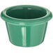 A green Carlisle smooth melamine ramekin with a rim.