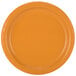 A close-up of a Creative Converting pumpkin spice orange paper plate.