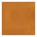 A close up of a Creative Converting Pumpkin Spice orange paper napkin with a square design.