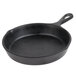 A black pan with a handle.