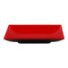 A red square plate with a black rim.