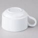 A white Elite Global Solutions melamine cup with a handle.