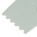 A white plastic piece with the words "Mercer Culinary" on it.