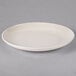 A white oval platter with a rim.