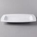 A white rectangular Libbey porcelain bowl on a gray background.