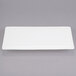 A white rectangular tray with a black border.