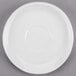 A white Libbey porcelain saucer with a small circle on the rim.